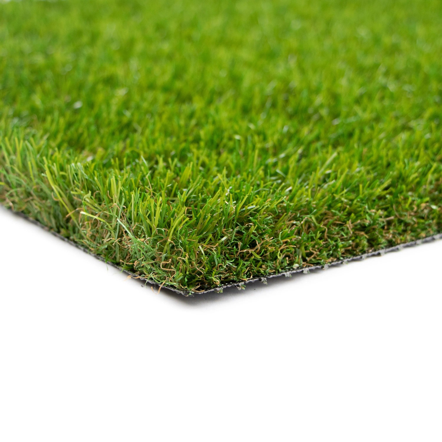 Nahaufnahme von Primaflor Kunstrasen Milo, 4m x 25m, mit grünen Halmen und Drainage-Noppen.