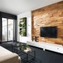 Wohnraum mit braunen Stegu Timber Verblender Wand.