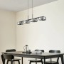Moderne, dimmbare LED Pendelleuchte Martis, 4-flammig, schwarz, aus Glas für Wohnzimmer.