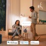 Szene mit Philips WIZ E14 Kerzenleuchten, die per Sprachsteuerung bedient werden.