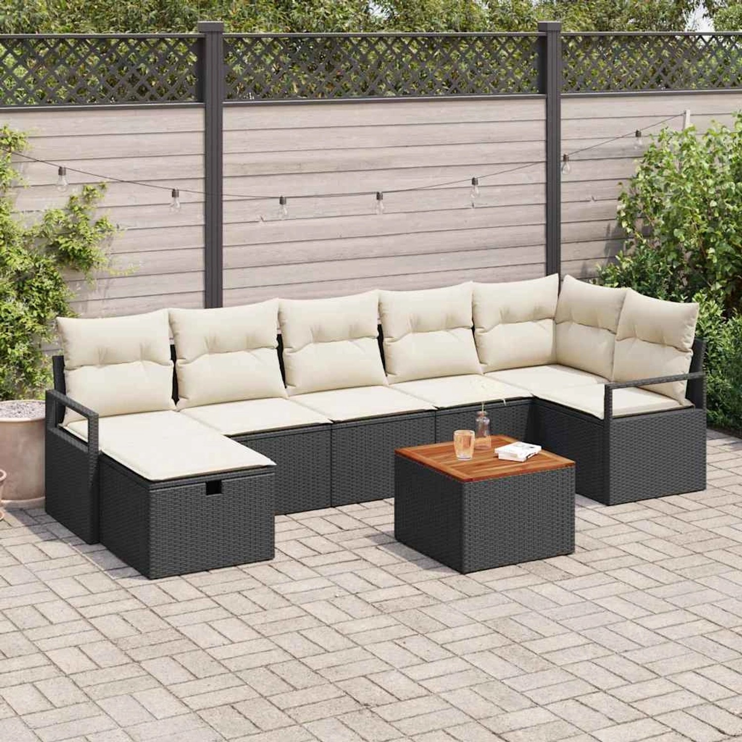 Schwarzes 8-teiliges vidaXL Garten-Sofa-Set aus Polyrattan mit Kissen und Tisch.