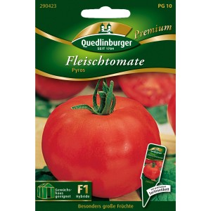 Samenpackung Quedlinburger Fleisch-Tomate Pyros mit roter Tomate im Vordergrund.