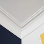 NOEL & MARQUET NMC Z40 Eckleisten (7 Stk.) in Weiß, montiert an Decke und Wand.