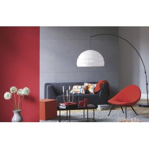 Wohnraum mit Alpina Farbrezepte Beton-Optik Betongrau Effektfarbe an der Wand.