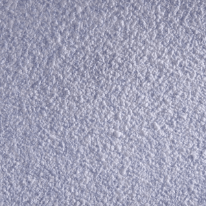 Nahaufnahme: Floxxan Baumwollputz California 212, blaue Flüssigtapete mit feiner Struktur.