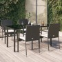 Schwarze 5-tlg. vidaXL Garten-Essgruppe aus Polyrattan mit Tisch und Stühlen mit cremefarbenen Kissen.