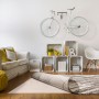Beige Luxor Living Teppichunterlage 120x190 cm unter einem Teppich im Wohnzimmer.