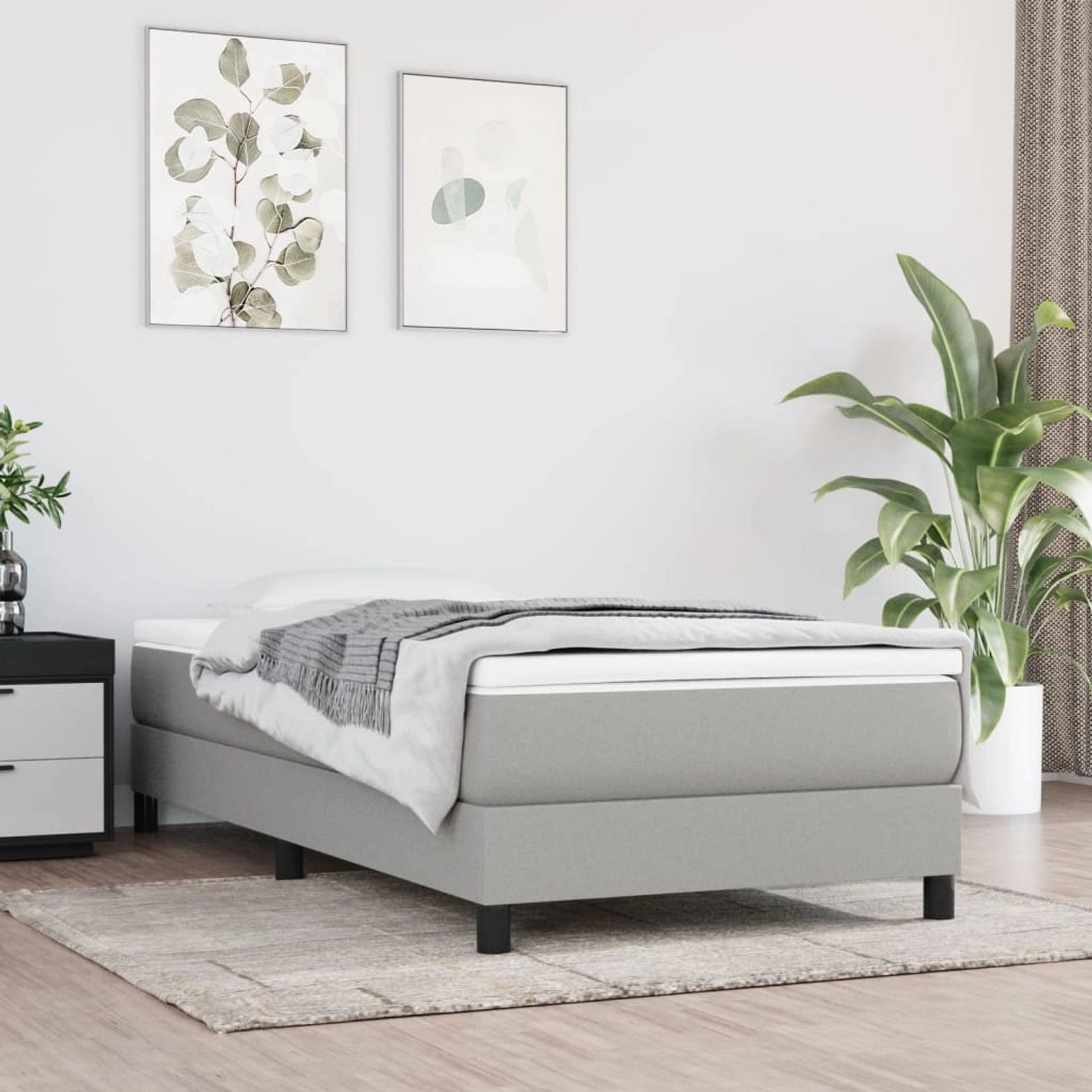 Helles vidaXL Boxspringbett, 90x190 cm, Stoffbezug. Bett mit Matratze und Decke im Schlafzimmer.