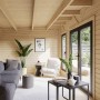 Innenansicht: Palmako Holz-Gartenhaus mit Pultdach, unbehandelt, eingerichtet mit Möbeln.