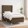 Boxspringbett dunkelbraun (90x200 cm) mit Matratze und Kopfteil.