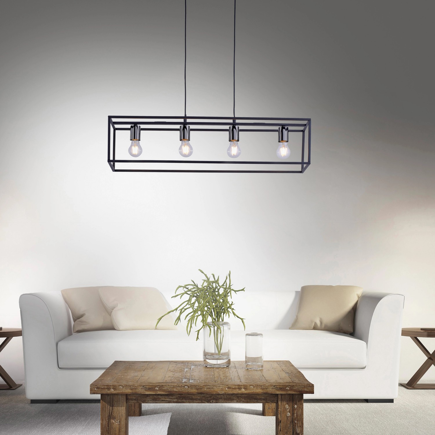 Schwarze 4-flammige Pendelleuchte Fabio im Vintage-Look über Wohnzimmer-Szene.