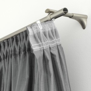 Gardinia X-Gelenkgleiter in Weiß an Gardinenschiene mit Vorhang.