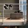 Modernes Edelstahlgeländer mit 5 Querstäben, seitlich montiert, für Treppen oder Balkone im Innenbereich.