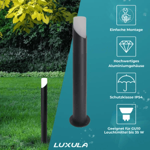 Schwarze LUXULA Außenstandleuchte aus Aluminium mit Erdspieß im Garten.