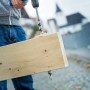 LUX Balkenbohrer Comfort (Ø 14 mm) im Einsatz an einem Holzbalken.