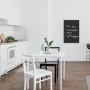 Vasner Infrarotheizung Citara T Tafelheizung 700W als beschreibbare Wandtafel im Esszimmer.
