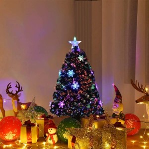 Künstlicher Weihnachtsbaum 90cm mit Glasfaser-Farbwechsel, Sternspitze und Schneeflocken in festlicher Szene.