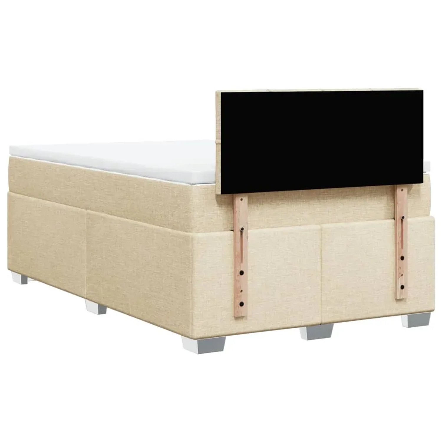 Cremefarbenes Boxspringbett 120x190 cm mit Matratze und Kopfteil.