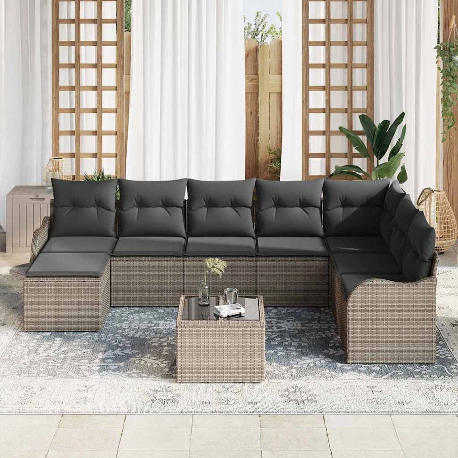 Graues 9-teiliges vidaXL Garten-Sofa-Set aus Poly Rattan mit Kissen und Tisch.