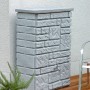 Arves Regentonne Maurano 300 l in Granit-Optik mit Wasserhahn im Garten.