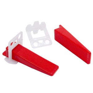 Dalsys Fliesen Nivelliersystem Set, bestehend aus roten Keilen und weißen Zuglaschen für 1 mm Fugen.