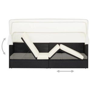 Schwarzes Gartensofa mit Sonnendach aus Poly Rattan. Sonnenliege mit verstellbaren Liegeflächen und cremefarbenen Kissen.