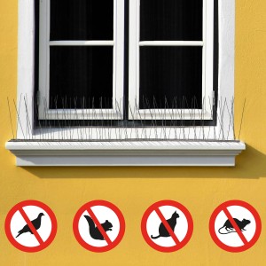 Niederberg Taubenabwehr mit Spikes aus Kunststoff am Fenster, gelbe Hauswand, Symbole für Tierabwehr.