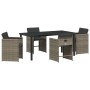 5-teiliges Garten-Ess-Set vidaXL aus grauem Rattan mit Tisch und Stühlen mit Kissen.