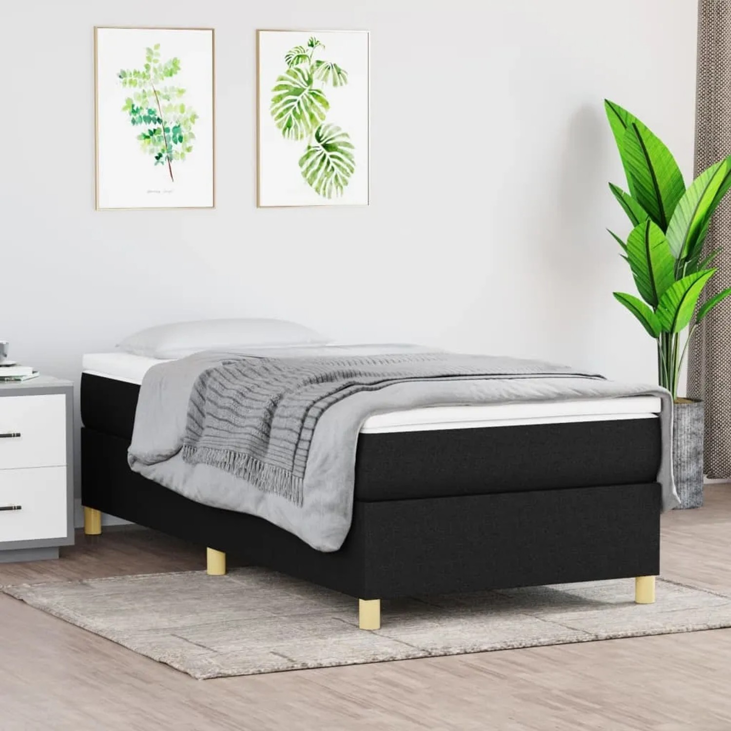 Schwarzes vidaXL Boxspringbett (90x200 cm) mit Stoffbezug und Holzfüßen.