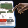 Smartphone mit Navimow App zur Steuerung des Segway Mähroboters i210E.