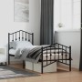 Schwarzes Metall Bettgestell (75x190 cm) mit Kopf- und Fußteil im Schlafzimmer.