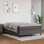 Graues vidaXL Boxspringbett (140x200 cm) mit Kunstlederbezug im Schlafzimmer.
