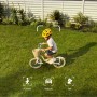 Eufy Flutlichtkamera E340: Kind fährt Rad im Garten, überwacht von der Kamera mit Personenerkennung.