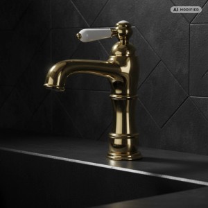 PaulGurkes Nostalgie Waschtischarmatur in Gold mit weißem Einhebelgriff auf dunklem Untergrund.