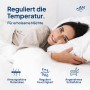 Frau entspannt auf AM Qualitätsmatratzen Gel Topper 180x200. Atmungsaktiv, reguliert Feuchtigkeit, angenehmes Schlafklima.