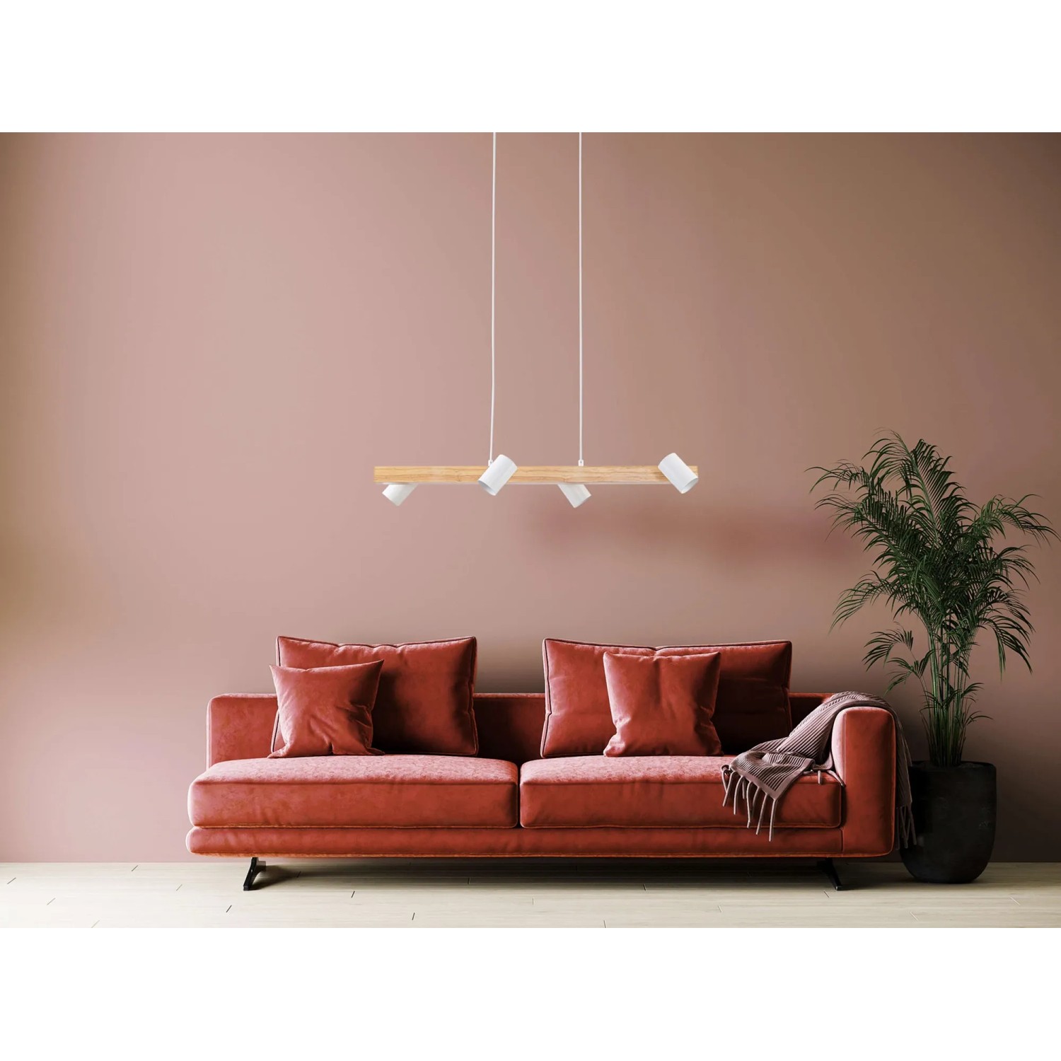 Näve Pendelleuchte Frida, 4-flammig, Holz/weiß, über Sofa im Wohnraum.