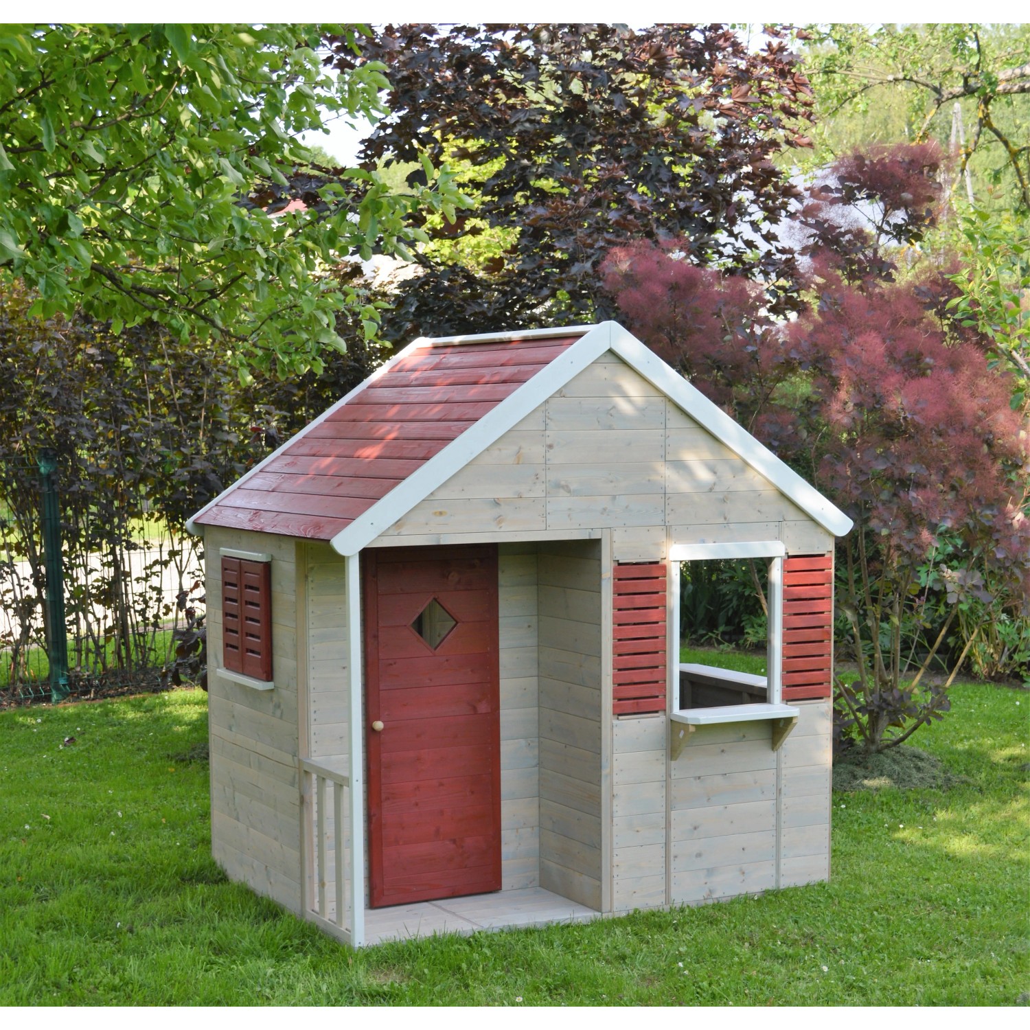 Wendi Toys Kinderspielhaus Krokodil mit Fenster und Veranda im Garten.