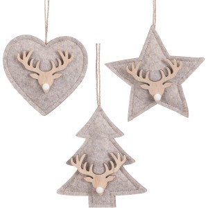 Filz-Ornamente in Herz-, Stern- und Baumform mit Holz-Rentierkopf als Baumbehang.