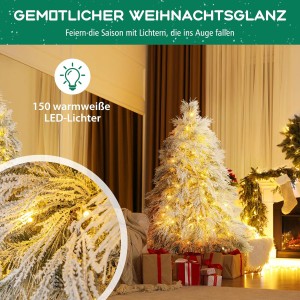 Künstlicher Weihnachtsbaum 146cm mit Schnee-Effekt und 150 warmweißen LED-Lichtern, festlich im Wohnzimmer.