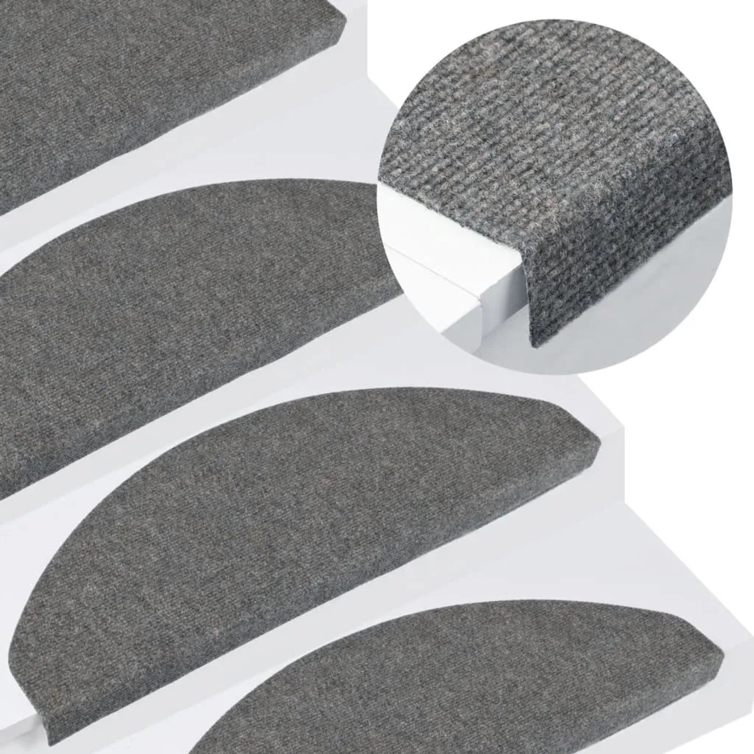 15 graue, selbstklebende VidaXL Stufenmatten (65x22,5x3,5 cm) auf einer Treppe.