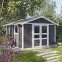 Grosfillex Gartenhaus Deco Domizil 11 in Dunkelgrau-Weiß mit Doppeltür im Garten.
