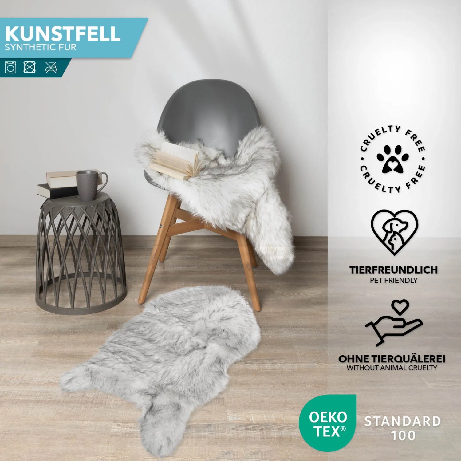 Flauschiges, hellgraues KARAT Kunstfell Nelly als Deko auf Stuhl und Boden.