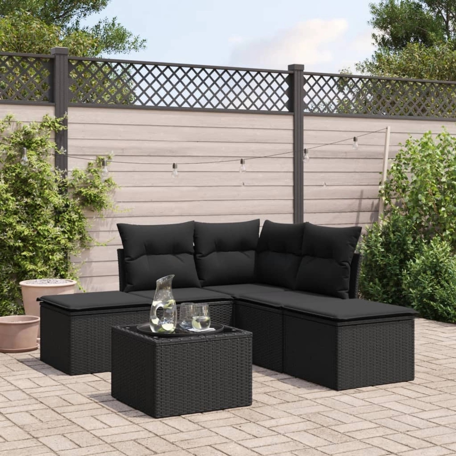Schwarze 6-tlg. vidaXL Garten-Sofagarnitur aus Poly Rattan mit Kissen für Garten oder Terrasse.