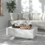 Moderner, betongrauer Couchtisch (85x55x31 cm) aus Holzwerkstoff im Wohnzimmer.