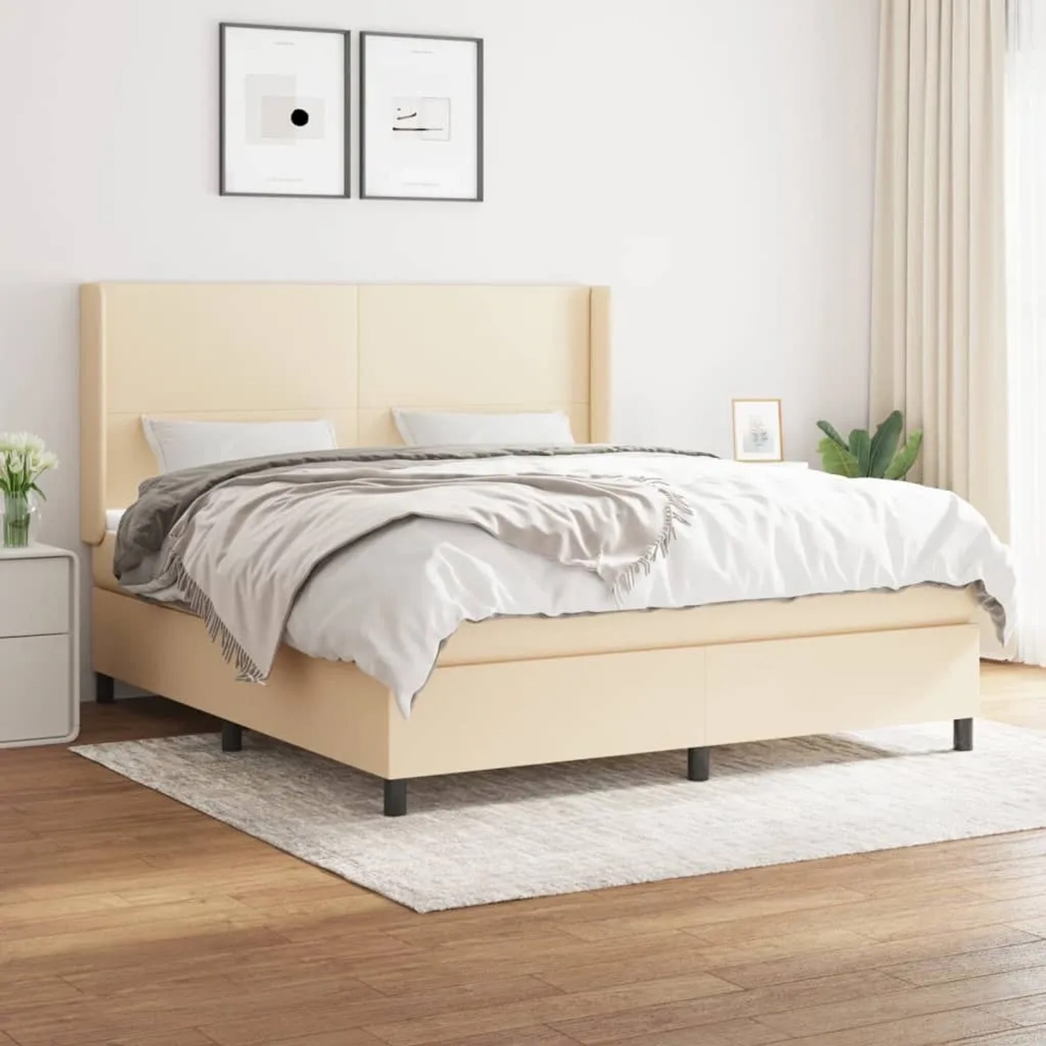 Cremefarbenes vidaXL Boxspringbett (180x200 cm) mit Matratze und hohem Kopfteil.