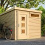 Unbehandeltes Weka Holz-Gartenhaus mit Flachdach und Fahrrad im Garten.