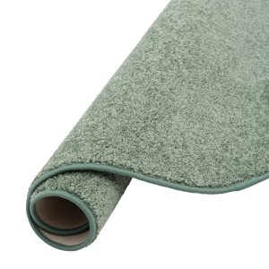 Gerollter, runder, mintgrüner Snapstyle Hochflor Teppich (160cm) mit Velours-Oberfläche.