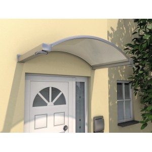 Gutta Rundbogenvordach NO 160 in Edelstahloptik über einer Haustür.