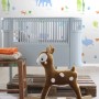 Kinderzimmer mit ESTAhome Fototapete Tiere Multicolor und Schaukelreh.