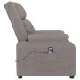 Elektrischer Relaxsessel in Taupe mit Fernbedienung in Seitentasche.